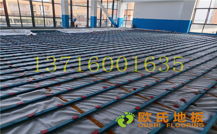 江蘇宿遷富民路學(xué)校體育館木地板案例-歐氏運(yùn)動(dòng)木地板廠家